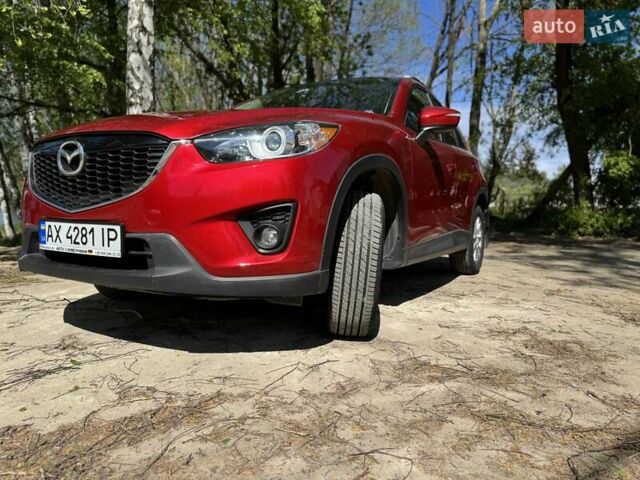 Красный Мазда СХ-5, объемом двигателя 2.5 л и пробегом 143 тыс. км за 13350 $, фото 1 на Automoto.ua