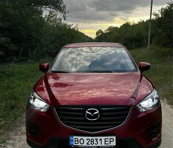 Красный Мазда СХ-5, объемом двигателя 2.2 л и пробегом 180 тыс. км за 16000 $, фото 1 на Automoto.ua