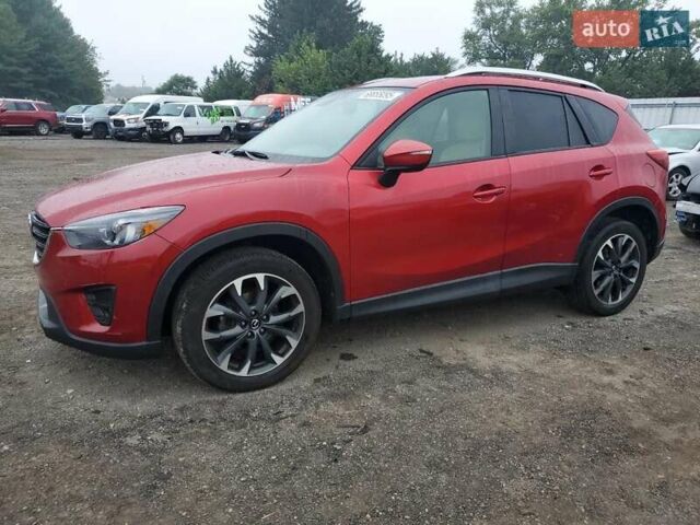 Красный Мазда СХ-5, объемом двигателя 2.5 л и пробегом 128 тыс. км за 2800 $, фото 1 на Automoto.ua
