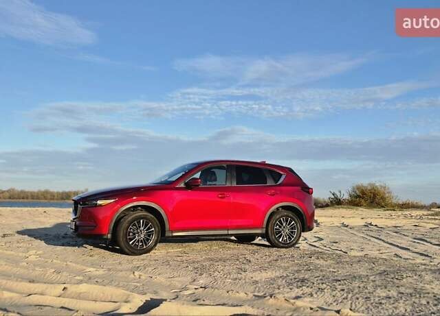 Красный Мазда СХ-5, объемом двигателя 2.49 л и пробегом 109 тыс. км за 22000 $, фото 1 на Automoto.ua