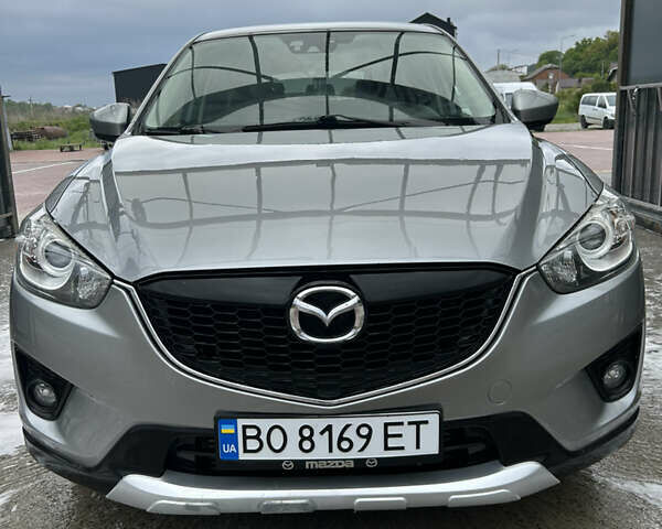 Серый Мазда СХ-5, объемом двигателя 2.2 л и пробегом 245 тыс. км за 10900 $, фото 1 на Automoto.ua