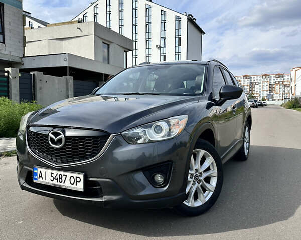 Серый Мазда СХ-5, объемом двигателя 2.5 л и пробегом 206 тыс. км за 12500 $, фото 1 на Automoto.ua