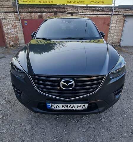 Серый Мазда СХ-5, объемом двигателя 2.19 л и пробегом 165 тыс. км за 15400 $, фото 1 на Automoto.ua
