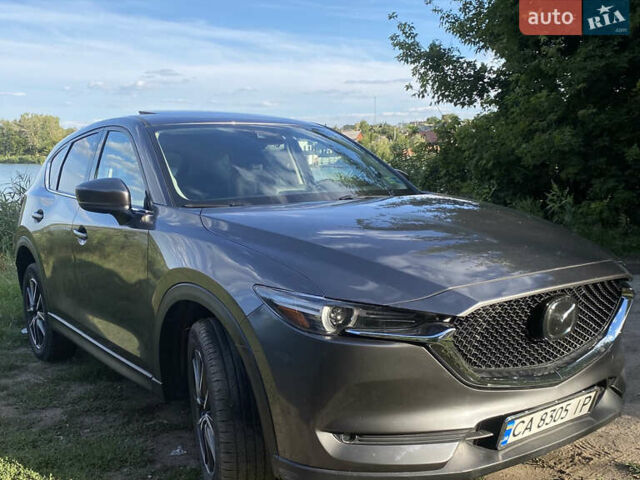 Серый Мазда СХ-5, объемом двигателя 2.49 л и пробегом 90 тыс. км за 18000 $, фото 1 на Automoto.ua