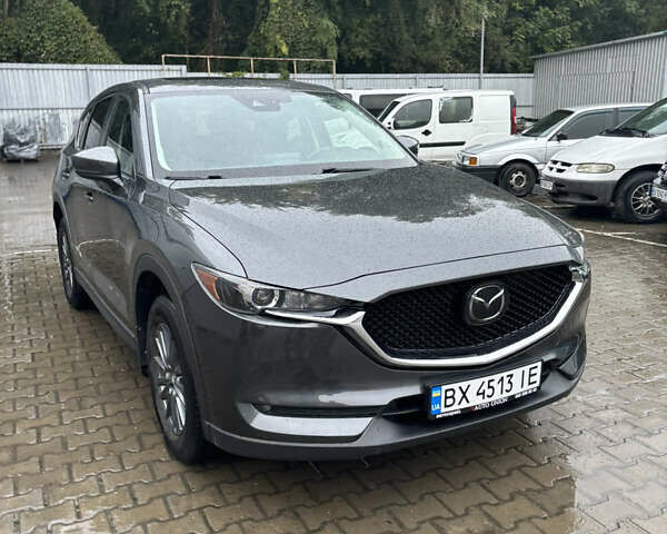 Серый Мазда СХ-5, объемом двигателя 2.49 л и пробегом 146 тыс. км за 18500 $, фото 1 на Automoto.ua