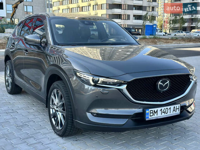 Серый Мазда СХ-5, объемом двигателя 2.49 л и пробегом 111 тыс. км за 22950 $, фото 1 на Automoto.ua