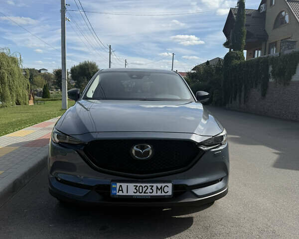 Серый Мазда СХ-5, объемом двигателя 2.49 л и пробегом 75 тыс. км за 23000 $, фото 1 на Automoto.ua