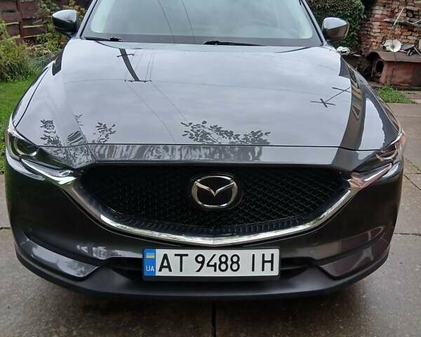 Серый Мазда СХ-5, объемом двигателя 2.49 л и пробегом 129 тыс. км за 17450 $, фото 1 на Automoto.ua
