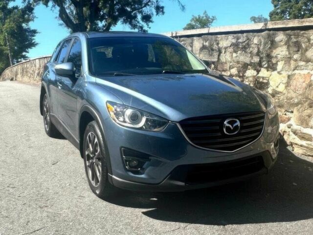 Синий Мазда СХ-5, объемом двигателя 2.5 л и пробегом 72 тыс. км за 9300 $, фото 1 на Automoto.ua