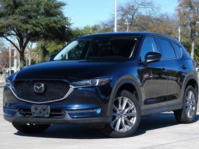 Синий Мазда СХ-5, объемом двигателя 2.5 л и пробегом 47 тыс. км за 10600 $, фото 1 на Automoto.ua