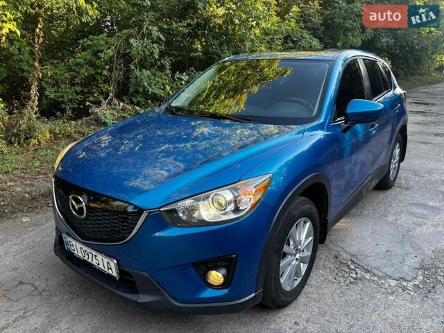Синий Мазда СХ-5, объемом двигателя 2 л и пробегом 218 тыс. км за 12700 $, фото 1 на Automoto.ua