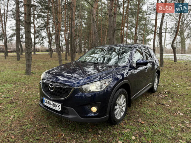 Синий Мазда СХ-5, объемом двигателя 2.19 л и пробегом 275 тыс. км за 12500 $, фото 1 на Automoto.ua