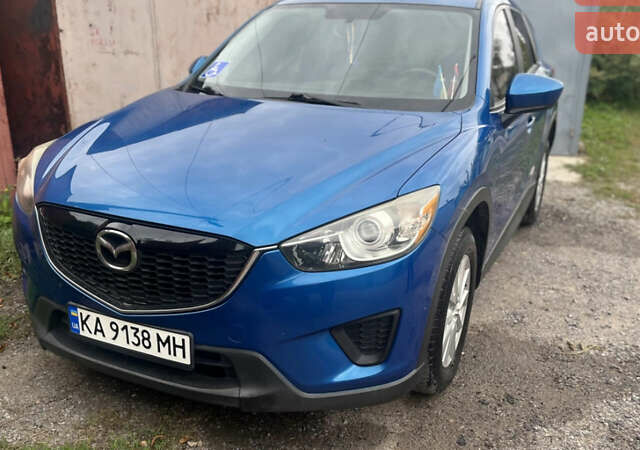 Синий Мазда СХ-5, объемом двигателя 2 л и пробегом 206 тыс. км за 12700 $, фото 1 на Automoto.ua