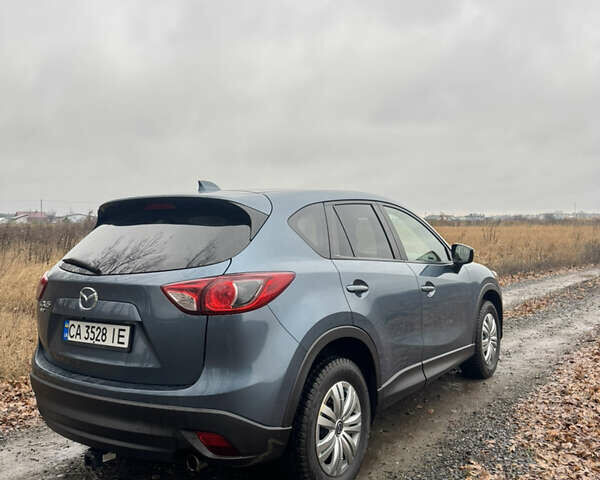 Синий Мазда СХ-5, объемом двигателя 2.49 л и пробегом 118 тыс. км за 13200 $, фото 1 на Automoto.ua
