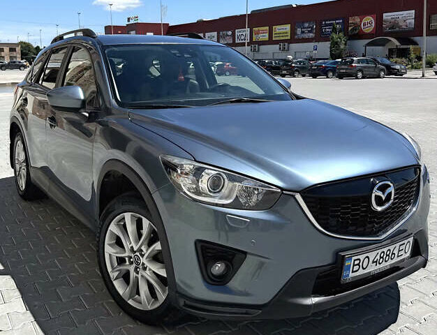 Синий Мазда СХ-5, объемом двигателя 2.2 л и пробегом 224 тыс. км за 17000 $, фото 1 на Automoto.ua