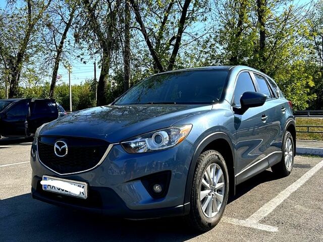 Синий Мазда СХ-5, объемом двигателя 2.5 л и пробегом 149 тыс. км за 14300 $, фото 1 на Automoto.ua