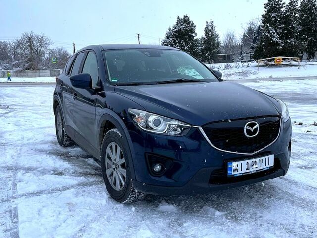 Синий Мазда СХ-5, объемом двигателя 22 л и пробегом 191 тыс. км за 13500 $, фото 1 на Automoto.ua
