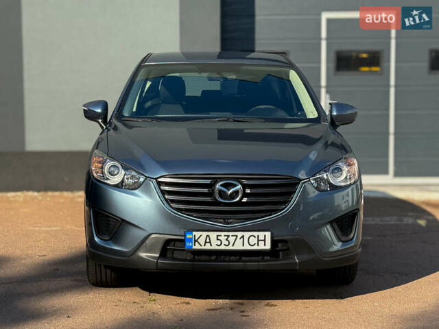 Синий Мазда СХ-5, объемом двигателя 2.49 л и пробегом 255 тыс. км за 13300 $, фото 1 на Automoto.ua