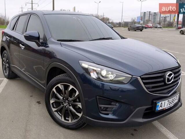 Синий Мазда СХ-5, объемом двигателя 2.5 л и пробегом 129 тыс. км за 16900 $, фото 1 на Automoto.ua