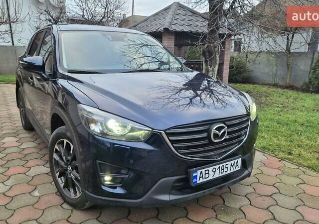 Синий Мазда СХ-5, объемом двигателя 2.19 л и пробегом 145 тыс. км за 15900 $, фото 1 на Automoto.ua