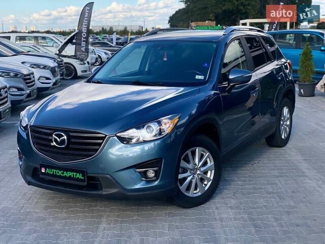 Синий Мазда СХ-5, объемом двигателя 2.49 л и пробегом 183 тыс. км за 14990 $, фото 1 на Automoto.ua