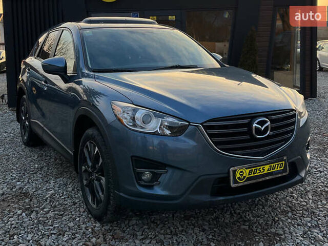 Синий Мазда СХ-5, объемом двигателя 2.49 л и пробегом 170 тыс. км за 16500 $, фото 1 на Automoto.ua