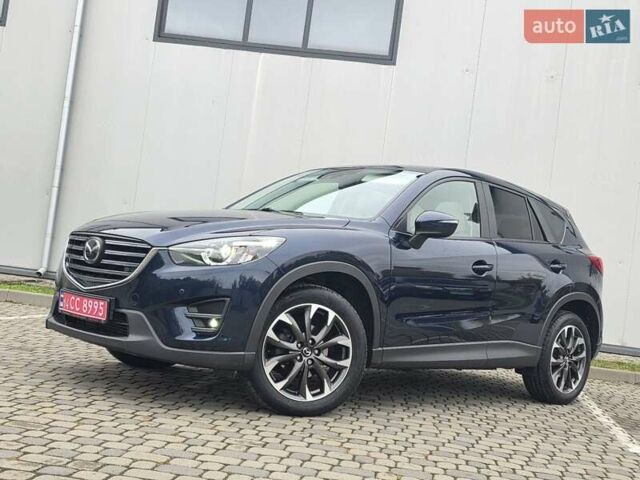 Синий Мазда СХ-5, объемом двигателя 2.2 л и пробегом 148 тыс. км за 18450 $, фото 1 на Automoto.ua