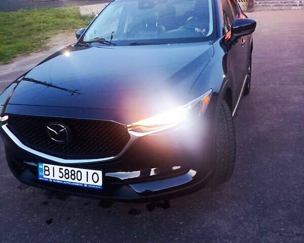 Синий Мазда СХ-5, объемом двигателя 2.5 л и пробегом 107 тыс. км за 21500 $, фото 1 на Automoto.ua