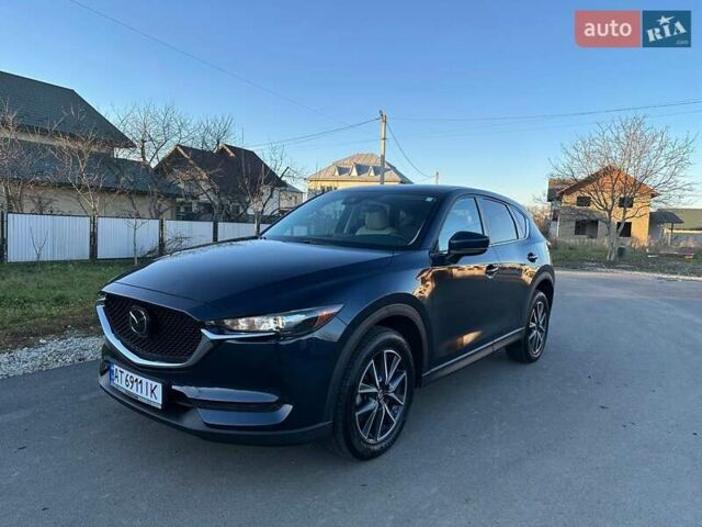 Синий Мазда СХ-5, объемом двигателя 2.5 л и пробегом 140 тыс. км за 18500 $, фото 1 на Automoto.ua