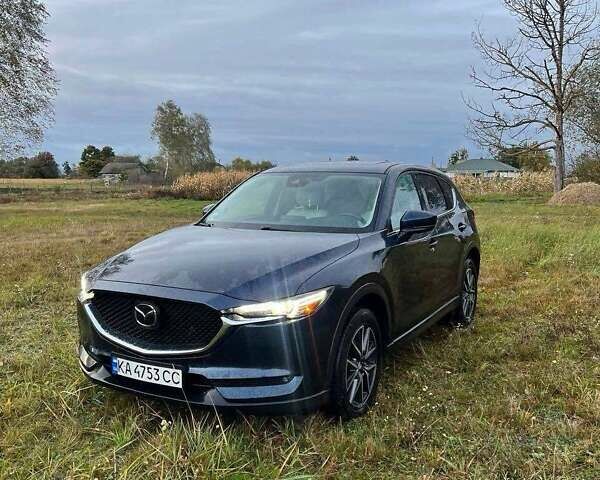 Синий Мазда СХ-5, объемом двигателя 2.49 л и пробегом 107 тыс. км за 18000 $, фото 1 на Automoto.ua