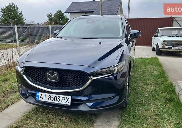 Синий Мазда СХ-5, объемом двигателя 2.49 л и пробегом 195 тыс. км за 23000 $, фото 1 на Automoto.ua
