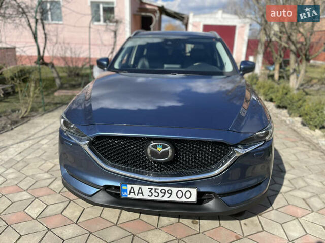 Синий Мазда СХ-5, объемом двигателя 2.49 л и пробегом 203 тыс. км за 16500 $, фото 1 на Automoto.ua