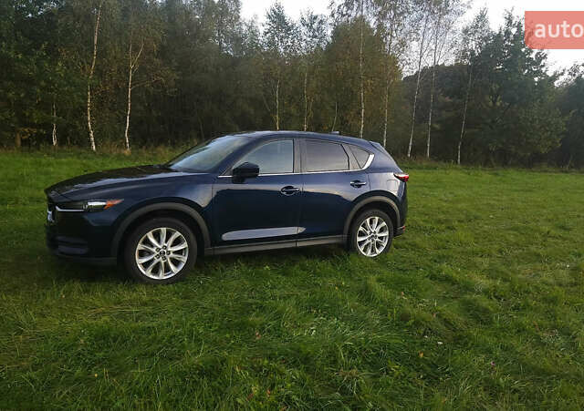 Синій Мазда СХ-5, об'ємом двигуна 2.49 л та пробігом 109 тис. км за 21500 $, фото 1 на Automoto.ua