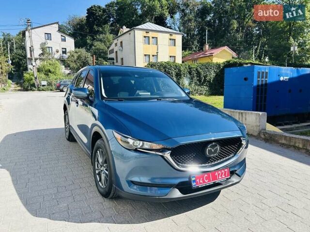 Синий Мазда СХ-5, объемом двигателя 2.5 л и пробегом 63 тыс. км за 18000 $, фото 1 на Automoto.ua