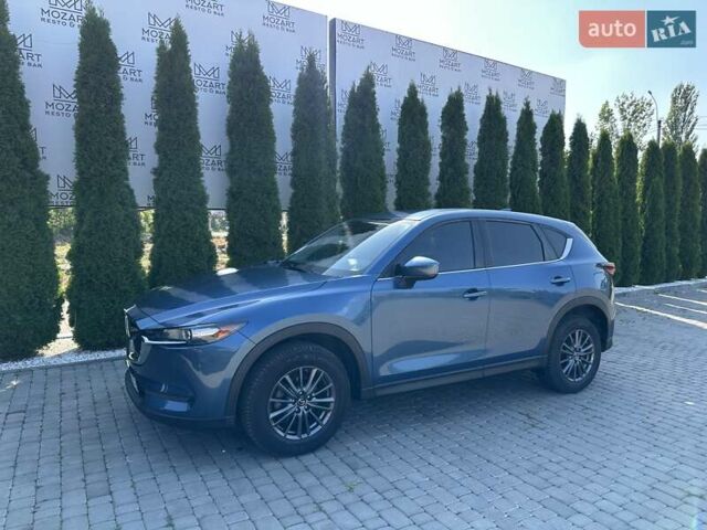 Синий Мазда СХ-5, объемом двигателя 2.5 л и пробегом 102 тыс. км за 19000 $, фото 1 на Automoto.ua