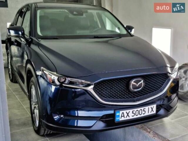 Синий Мазда СХ-5, объемом двигателя 2.49 л и пробегом 106 тыс. км за 23500 $, фото 1 на Automoto.ua