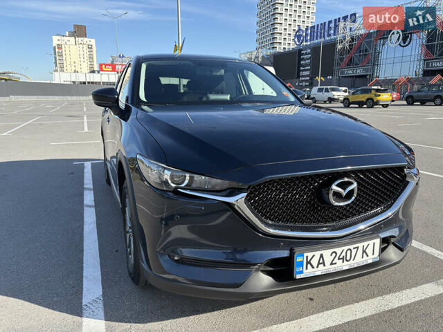 Синий Мазда СХ-5, объемом двигателя 2 л и пробегом 115 тыс. км за 23900 $, фото 1 на Automoto.ua