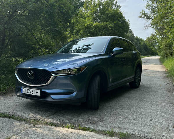 Синий Мазда СХ-5, объемом двигателя 2.49 л и пробегом 122 тыс. км за 21000 $, фото 1 на Automoto.ua