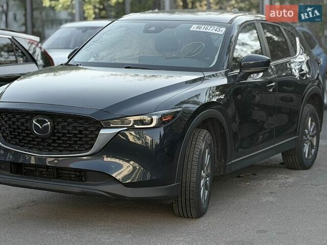 Синий Мазда СХ-5, объемом двигателя 2.5 л и пробегом 83 тыс. км за 15100 $, фото 1 на Automoto.ua