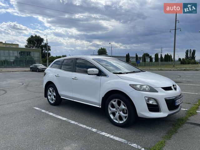 Белый Мазда СХ-7, объемом двигателя 2.2 л и пробегом 225 тыс. км за 9999 $, фото 1 на Automoto.ua