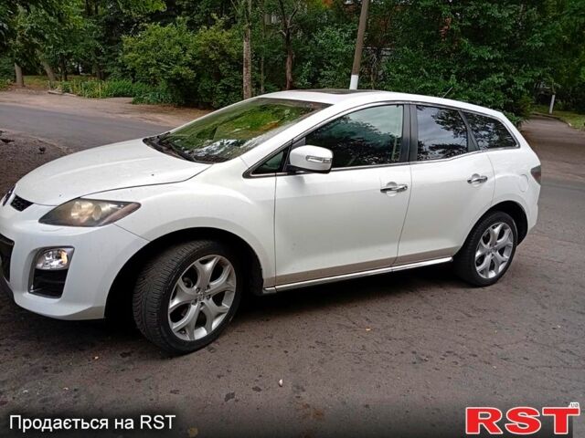 Белый Мазда СХ-7, объемом двигателя 2.3 л и пробегом 175 тыс. км за 8000 $, фото 1 на Automoto.ua