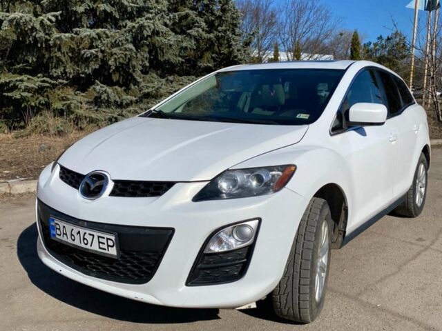 Белый Мазда СХ-7, объемом двигателя 2.5 л и пробегом 167 тыс. км за 9300 $, фото 1 на Automoto.ua