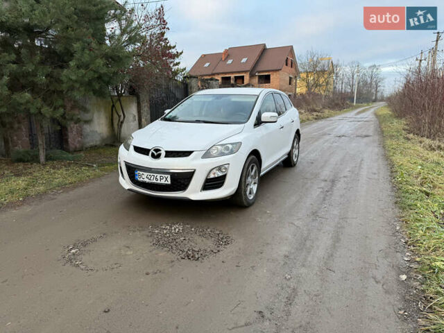 Белый Мазда СХ-7, объемом двигателя 2.18 л и пробегом 229 тыс. км за 10500 $, фото 1 на Automoto.ua