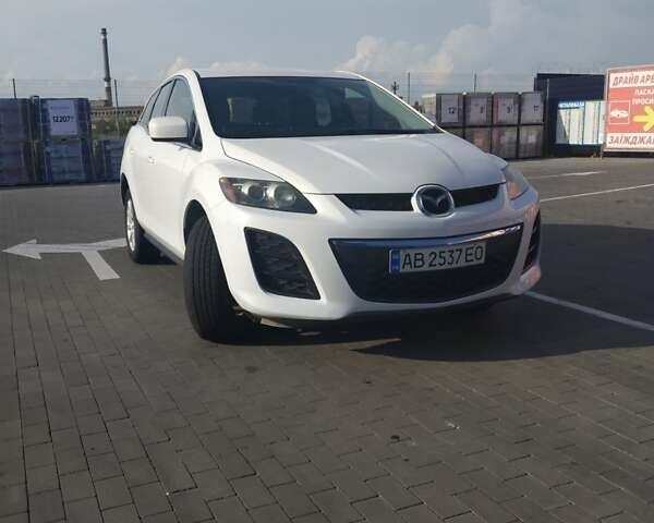 Белый Мазда СХ-7, объемом двигателя 2.5 л и пробегом 155 тыс. км за 9999 $, фото 1 на Automoto.ua