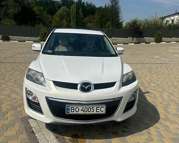 Білий Мазда СХ-7, об'ємом двигуна 2.2 л та пробігом 233 тис. км за 10900 $, фото 1 на Automoto.ua