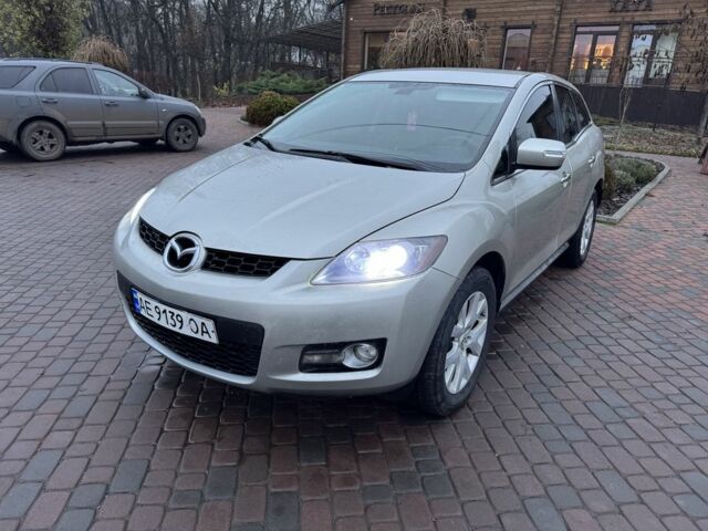 Бежевый Мазда СХ-7, объемом двигателя 2.3 л и пробегом 135 тыс. км за 7000 $, фото 1 на Automoto.ua