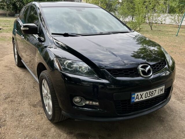 Черный Мазда СХ-7, объемом двигателя 2.3 л и пробегом 130 тыс. км за 7100 $, фото 1 на Automoto.ua