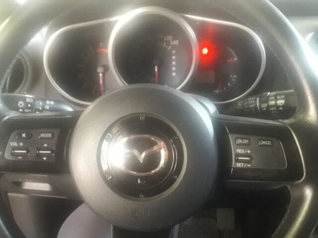 Черный Мазда СХ-7, объемом двигателя 2.3 л и пробегом 165 тыс. км за 6600 $, фото 1 на Automoto.ua