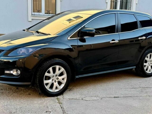 Черный Мазда СХ-7, объемом двигателя 2.3 л и пробегом 180 тыс. км за 7100 $, фото 1 на Automoto.ua