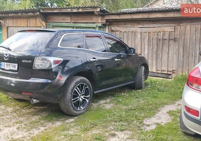 Черный Мазда СХ-7, объемом двигателя 2.3 л и пробегом 160 тыс. км за 7300 $, фото 1 на Automoto.ua